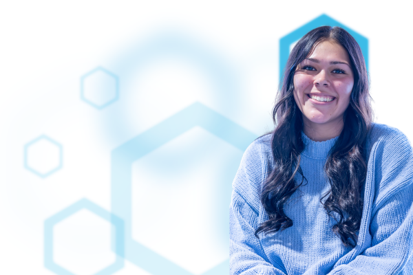 Shelby Hernandez with blue hexagons in the background.